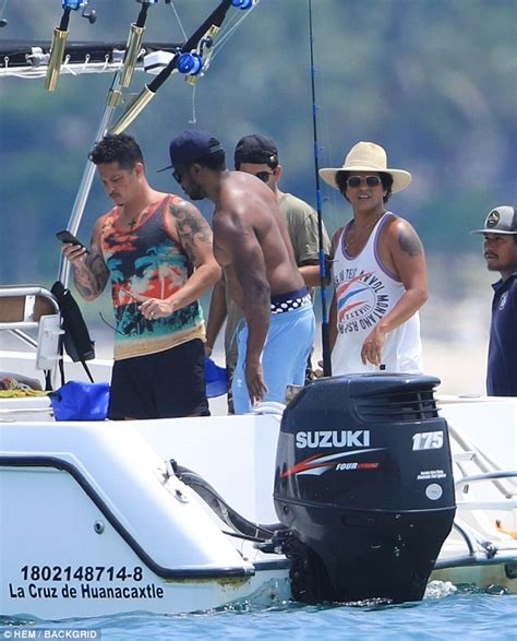 bruno mars naked|Bruno Mars slips on printed trunks for beach day with girlfriend